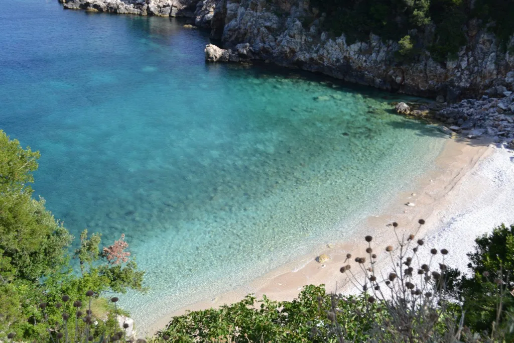 Bristani Bay’s pebble beach and clear water